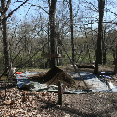 Sifting equipment is used to identify cultural artifacts contained in excavated soil